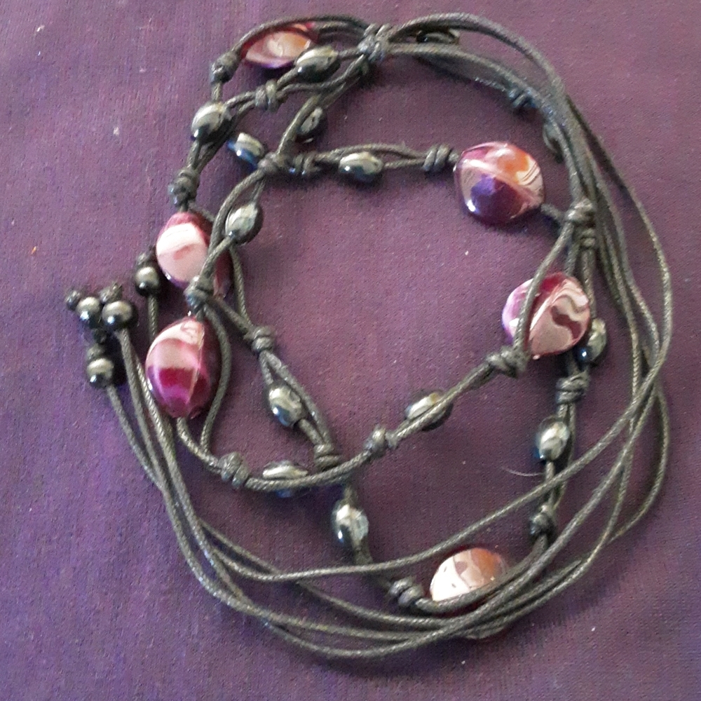 Beaded lacing belt